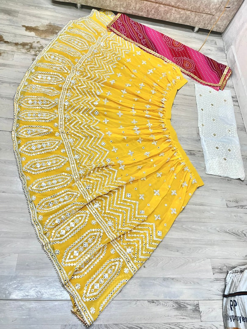 Yellow georgette thread paper mirror work lehenga choli for ceremony function