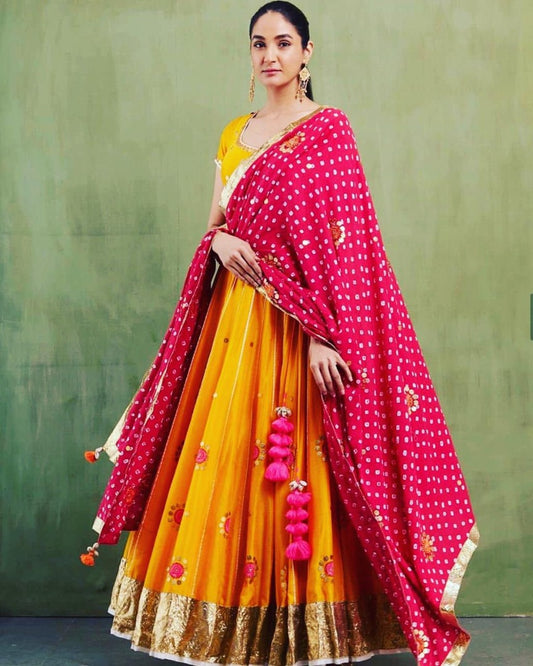 Yellow georgette zari and thread embroidered lehenga choli