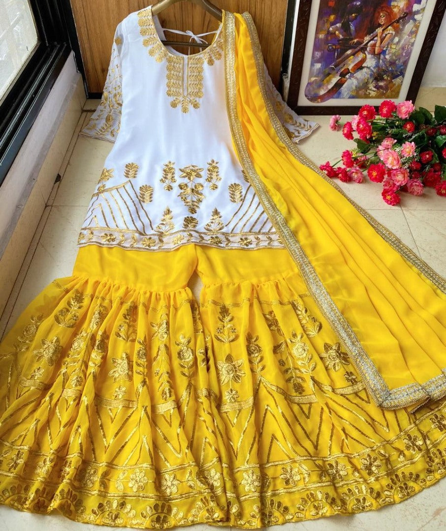 Yellow georgette zari embroidered work plazzo suit