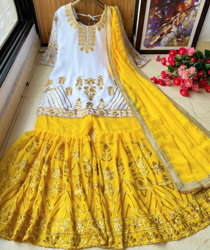 Yellow georgette zari embroidered work plazzo suit