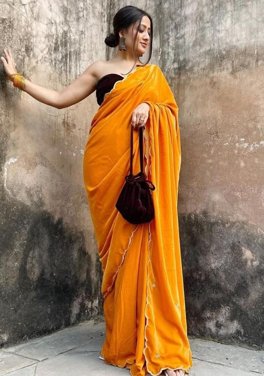 Yellow heavy velvet handwork saree