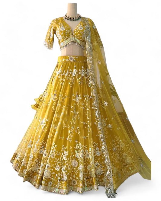 Yellow heavy work designer ceremonial lehenga choli