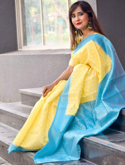 Yellow lichi silk jacquard weaving work saree