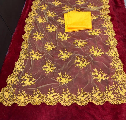 yellow net beautiful heavy embroidered surbhi jyoti saree