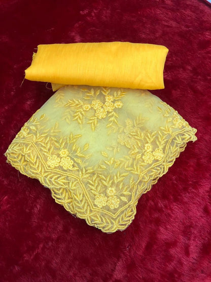 yellow net beautiful heavy embroidered surbhi jyoti saree
