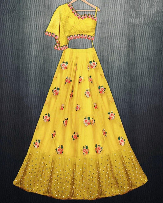 Yellow net embroidered lehenga choli