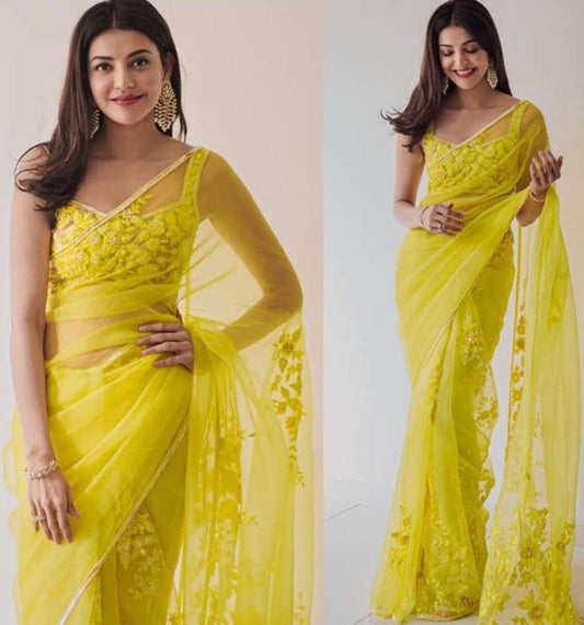 Yellow net embroidered saree