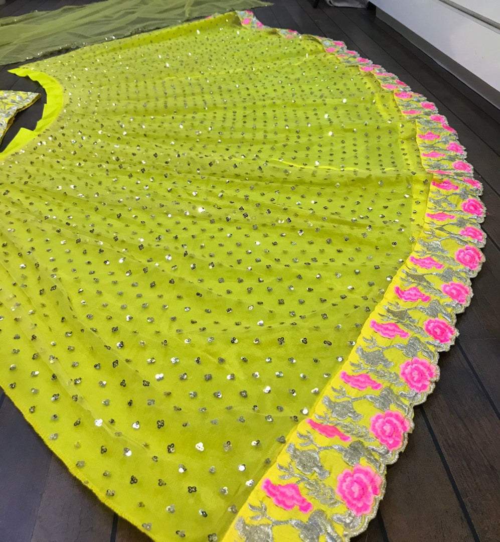 Yellow net sequence and thread embroidered ceremonial lehenga choli