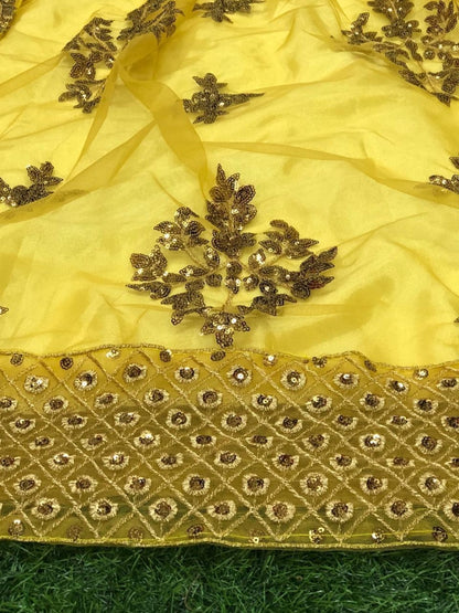 Yellow net sequence worked wedding gown with dupatta