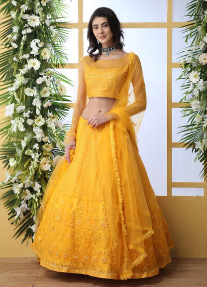 Yellow net thread and sequence embroidered wedding lehenga choli