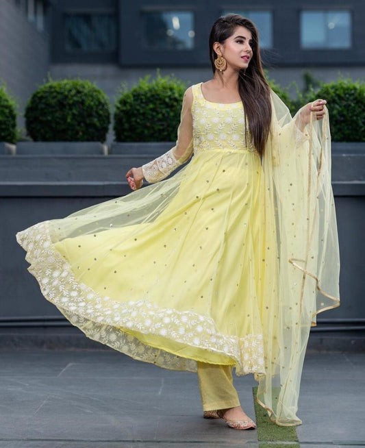 Yellow net thread embroidered anarkali suit