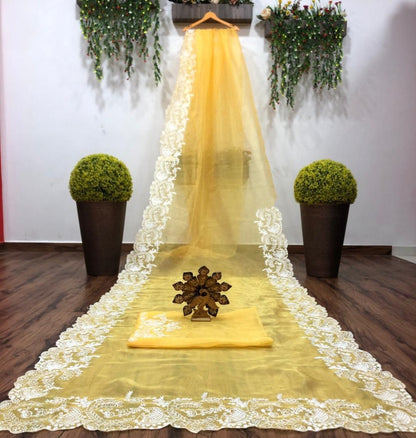 Yellow organza chainstitch work saree