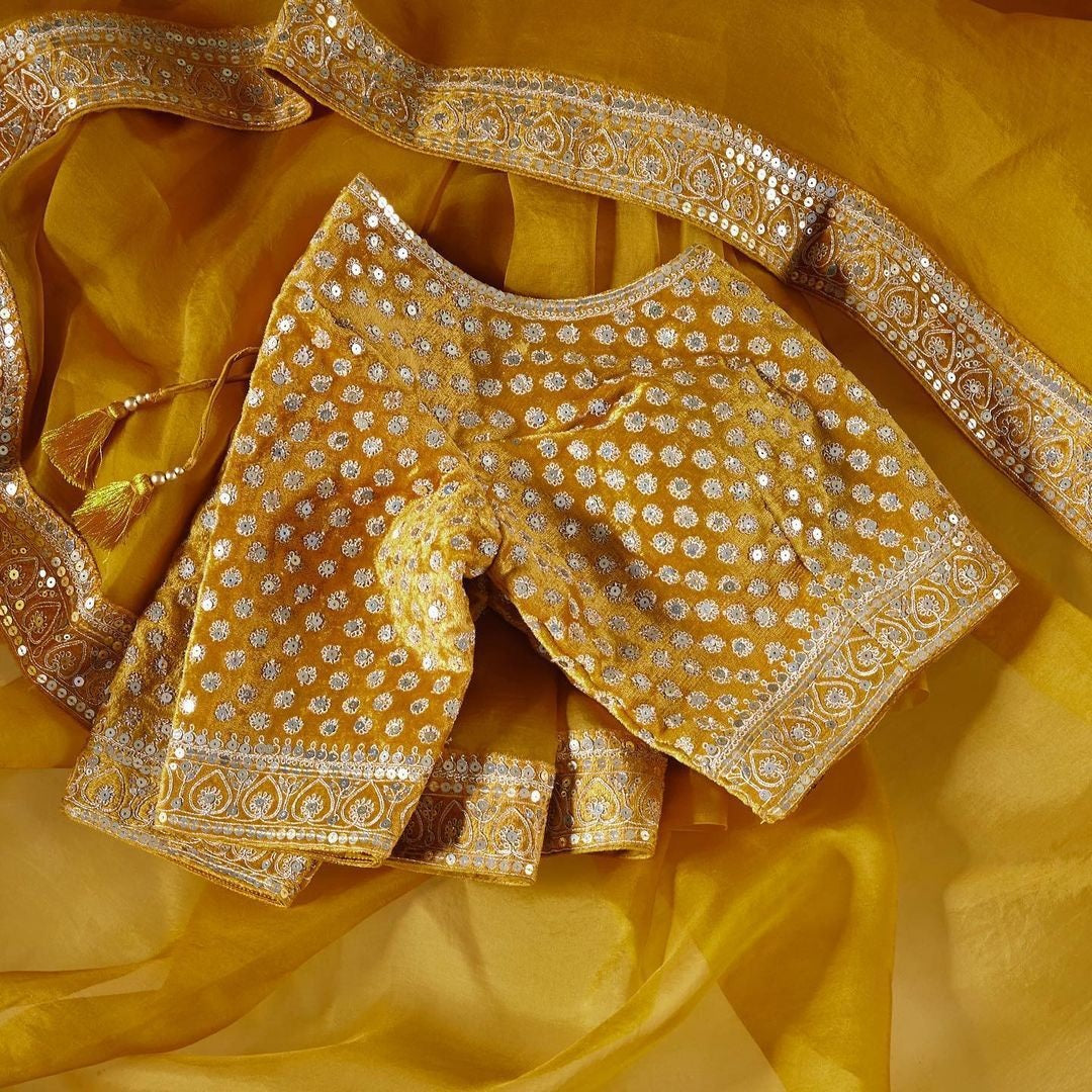 Yellow organza coading and sequence work wedding saree