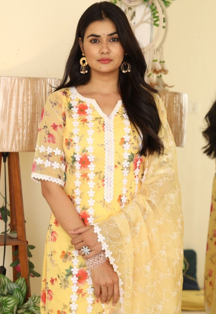 Yellow organza print and thread work pant salwar suit