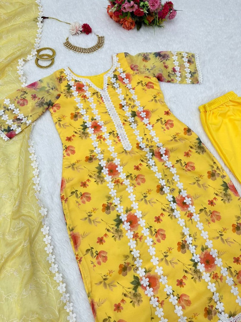 Yellow organza print and thread work pant salwar suit
