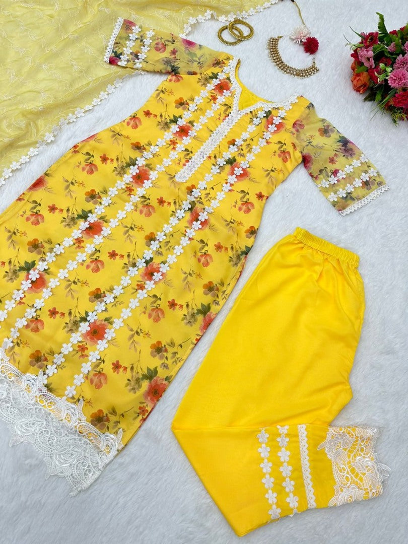 Yellow organza print and thread work pant salwar suit