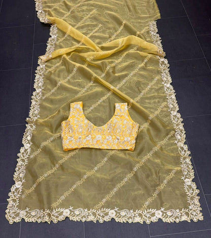Yellow organza theread embroidered saree