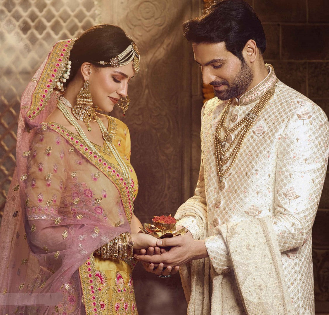 Yellow organza thread stone and sequence work bridal lehenga choli