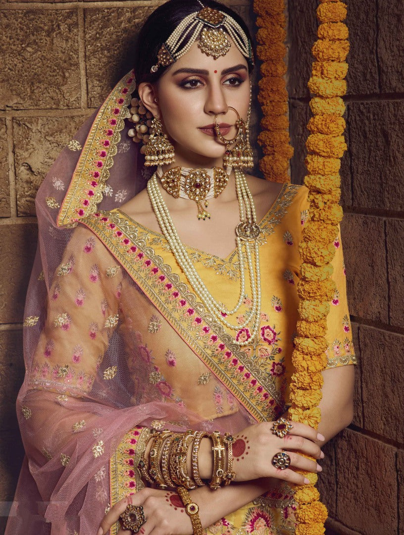 Yellow organza thread stone and sequence work bridal lehenga choli