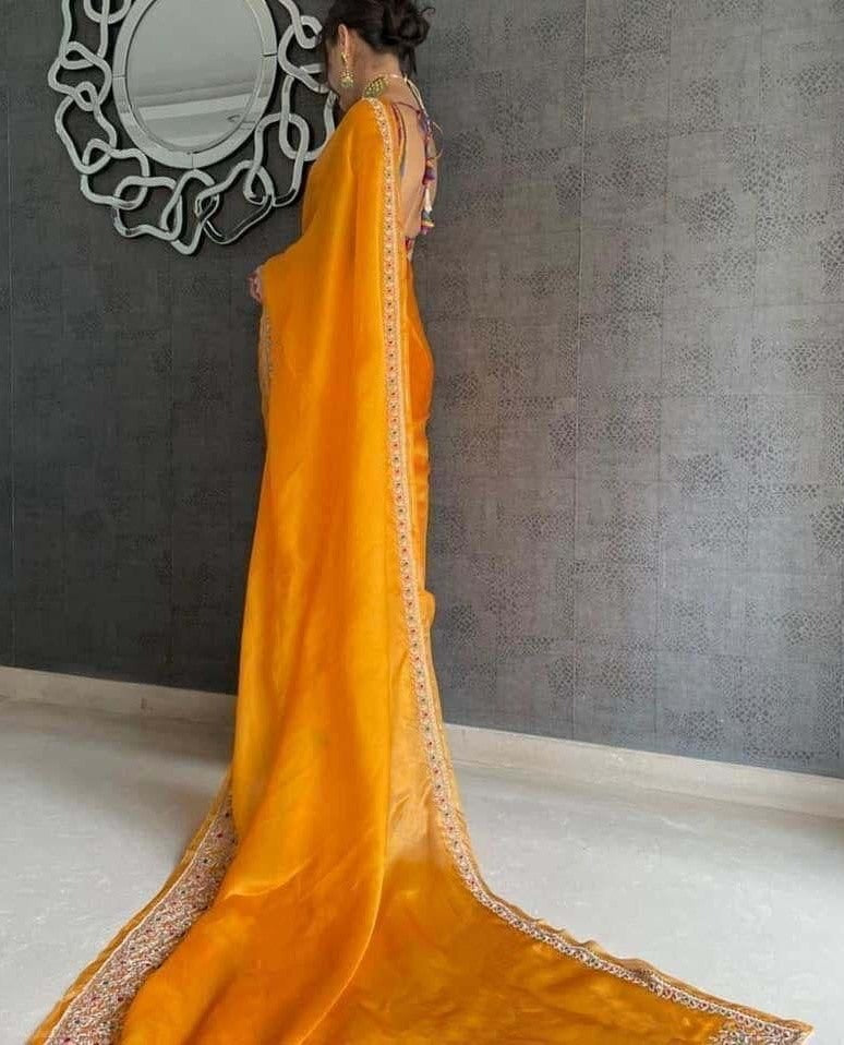 Yellow organza thread work festive saree