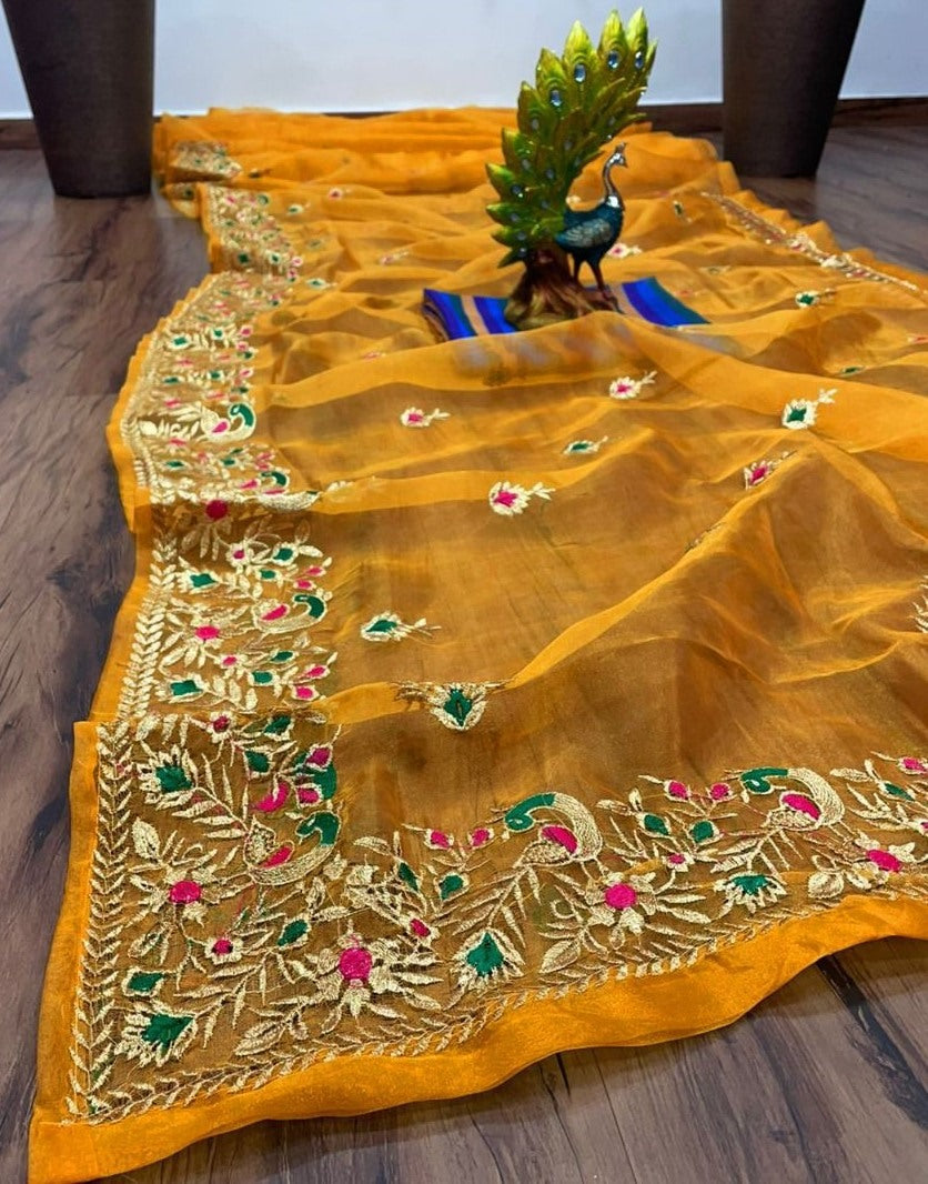 Yellow organza thread work festive saree