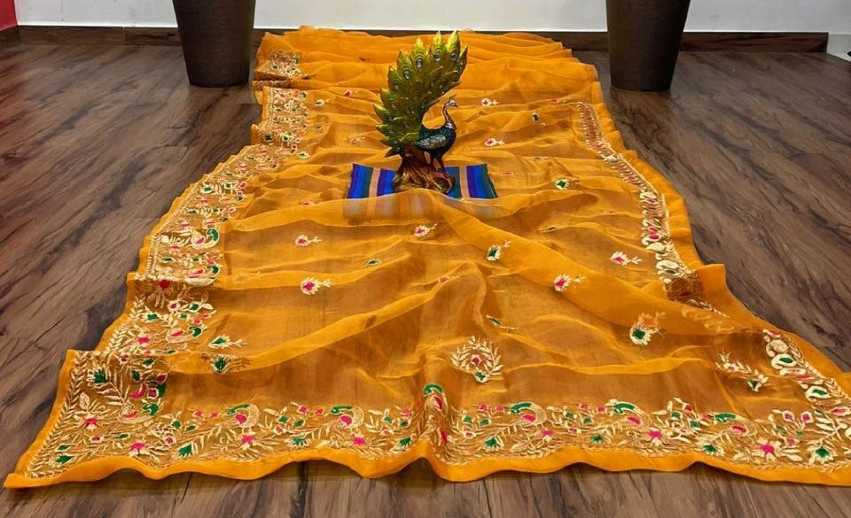 Yellow organza thread work festive saree