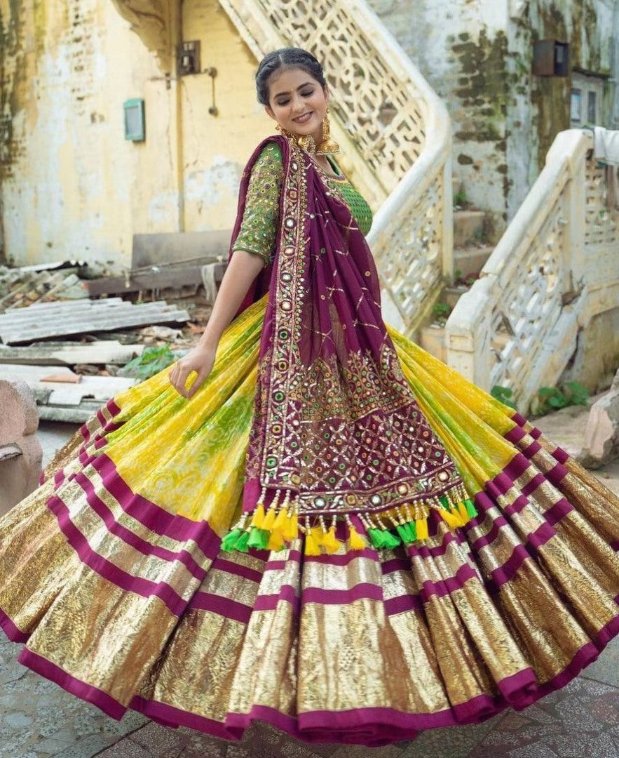 Yellow print and mirror work gujarati garba navratri lehenga chaniya choli