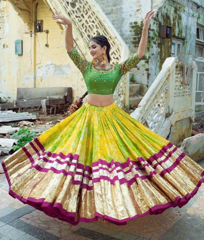 Yellow print and mirror work gujarati garba navratri lehenga chaniya choli