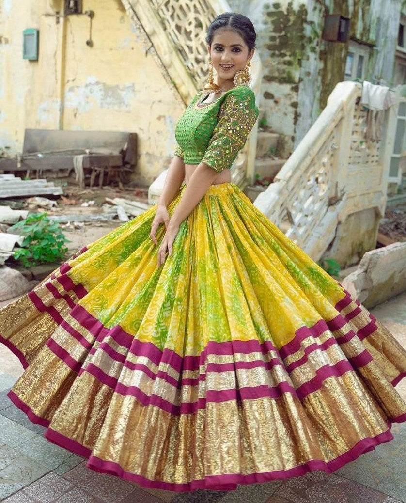 Yellow print and mirror work gujarati garba navratri lehenga chaniya choli