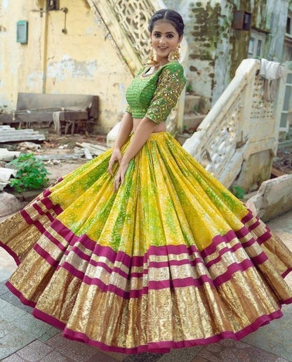Yellow print and mirror work gujarati garba navratri lehenga chaniya choli