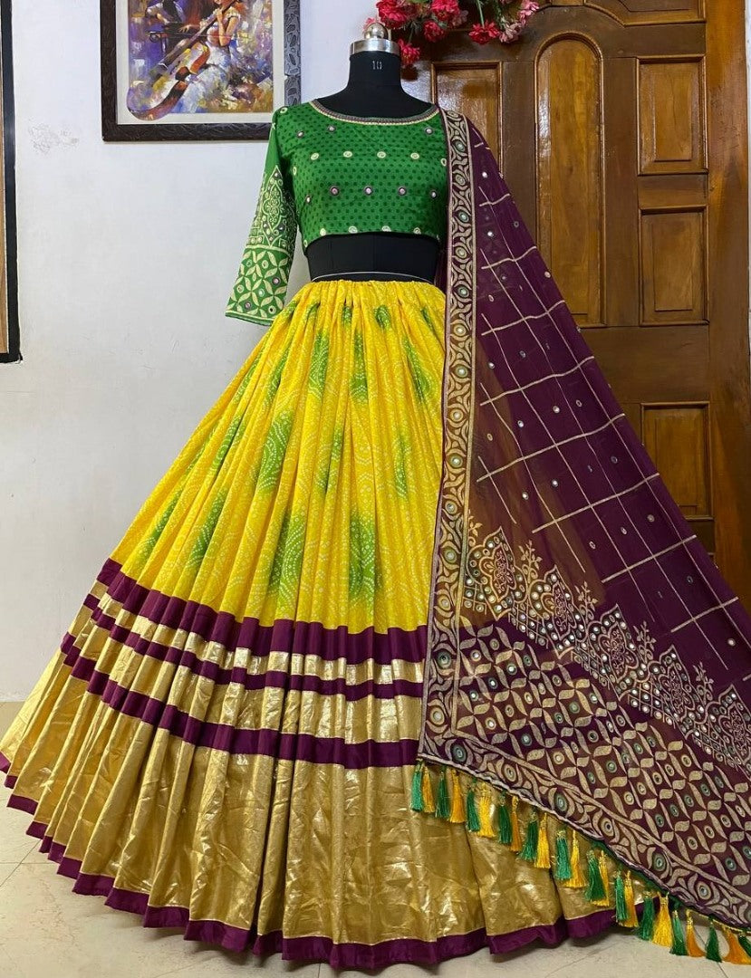 Yellow print and mirror work gujarati garba navratri lehenga chaniya choli