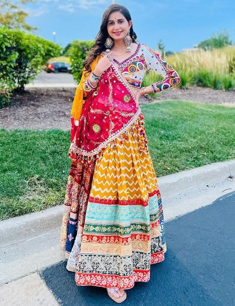 Yellow print mirror work kinjal dave gujarati garba navratri chaniya choli
