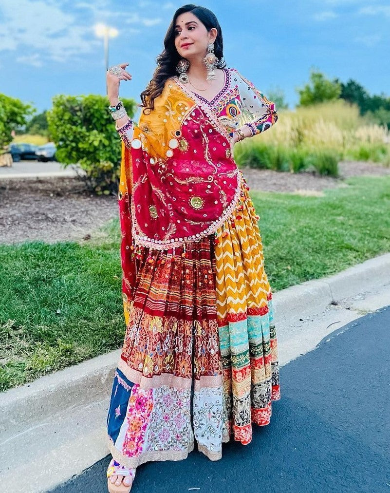 Yellow print mirror work kinjal dave gujarati garba navratri chaniya choli