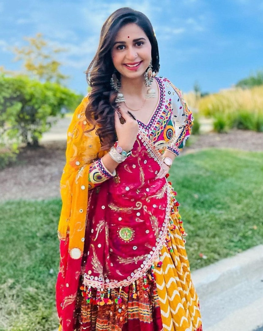 Yellow print mirror work kinjal dave gujarati garba navratri chaniya choli