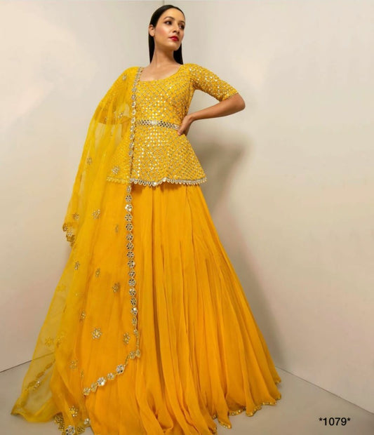 Yellow sequence work lehenga with long choli
