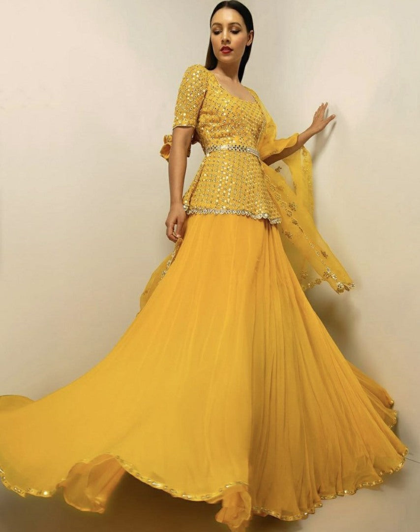 Yellow sequence work lehenga with long choli