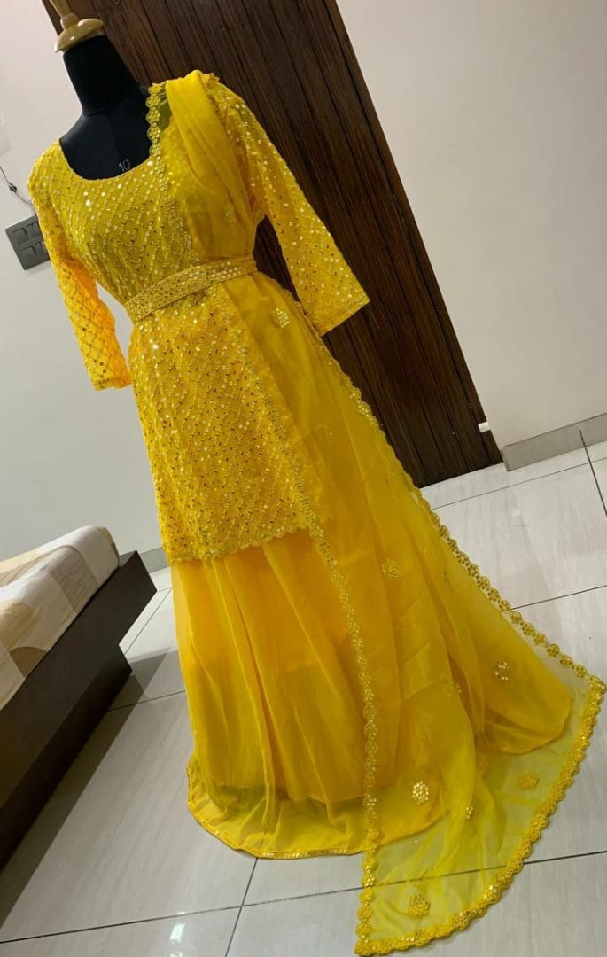 Yellow sequence work lehenga with long choli