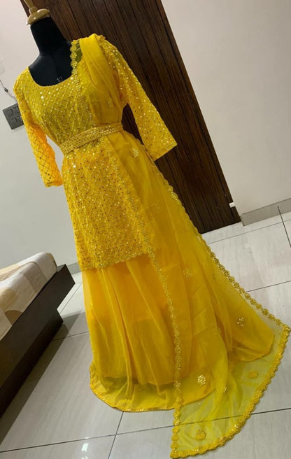 Yellow sequence work lehenga with long choli
