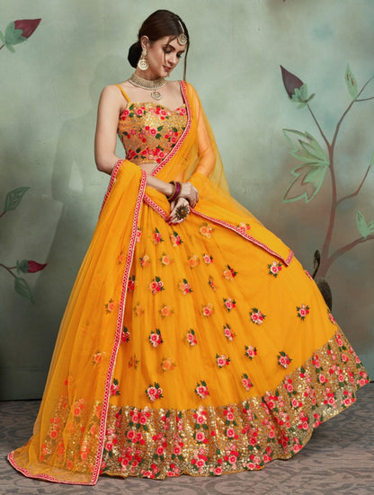 Yellow soft net sequence and theadworked lehenga choli for haldi
