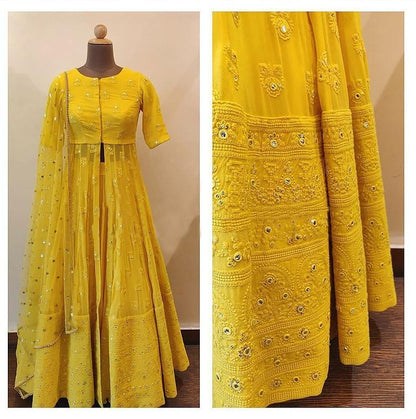 Yellow tapeta lehenga with long choli