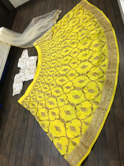 yellow tapeta silk embroidered wedding lehenga choli