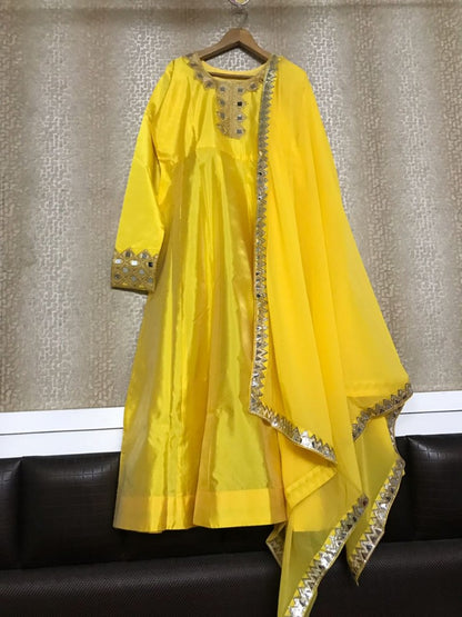 yellow tapeta silk mirrow worked anarkali suit